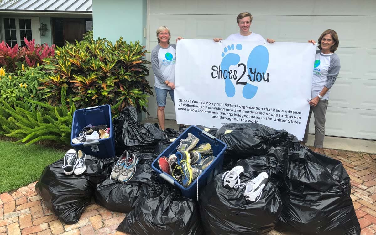 Children trying on new shoes