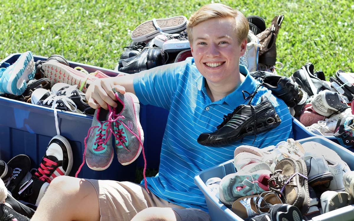 Collection of donated shoes organized for distribution